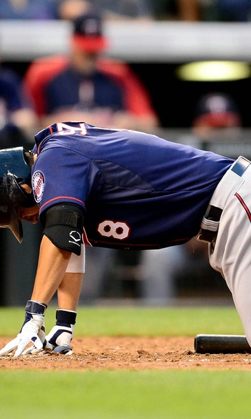 Rockies rough up Twins, 6-2